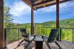 atelier-maison-casa-bonita-california-mountain-ranch-the-cliffs-mountain-park-marietta-sc-design-services-covered-deck-adirondack-chairs-cable-railing-forest-view-07