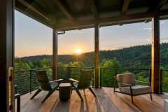 atelier-maison-casa-bonita-california-mountain-ranch-the-cliffs-mountain-park-marietta-sc-design-services-covered-deck-sunset-adirondack-chairs-mountain-silhouette-17