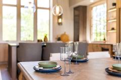 atelier-maison-casa-bonita-california-mountain-ranch-the-cliffs-mountain-park-marietta-sc-design-services-dining-detail-place-setting-green-bowls-glassware-14